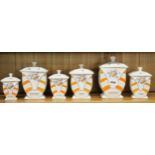 A set of six Art Deco French kitchen ceramic canisters, tallest 19cms.