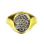 An 18ct yellow gold signet ring set with diamonds, (R.5).