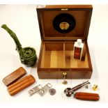 A humidor and quantity of smoking related items.