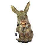 An early 20th century cold painted spelter Donkey money box, H. 13cms.