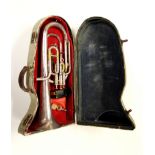 A cased silver plated tenor horn.