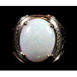 A large 14ct yellow gold (stamped 14ct) opal set ring, ( R ).