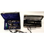 Two cased clarinets.