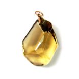 A yellow metal mounted large quartz pendant, L. 4cm.