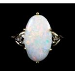 A 9ct yellow gold opal set ring with diamond set shoulders (M).