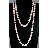 A cultured pearl and pink stone bead necklace, L. 60cm.