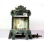 A 19th century enamelled cast iron gas kettle stand/heater, H. 32cms.