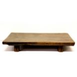 A 19th century Chinese elm wood kang table, Size. 64 x 40 x 9cms.