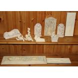 A collection of classical plaster and other items.