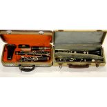 Two cased clarinets.