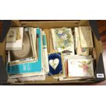 A box of mixed photographs, greetings cards and ephemera.