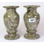 A pair of turned granite vases, H. 20cms.