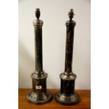 A pair of early 20th century silver plated column table lamp bases, H. 62cms.