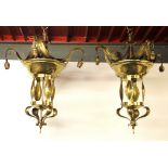 A pair of Art Nouveau style brass chandelier light fittings, D. 65cms.