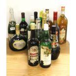 A quantity of vintage bottles of wines and spirits.