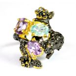 A Hana Maae 925 silver gilt frog shaped ring set with amethyst, sapphire and blue topaz, (P.5).