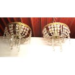 A pair of gilt metal and crystal ceiling lights, Dia. 32cms.