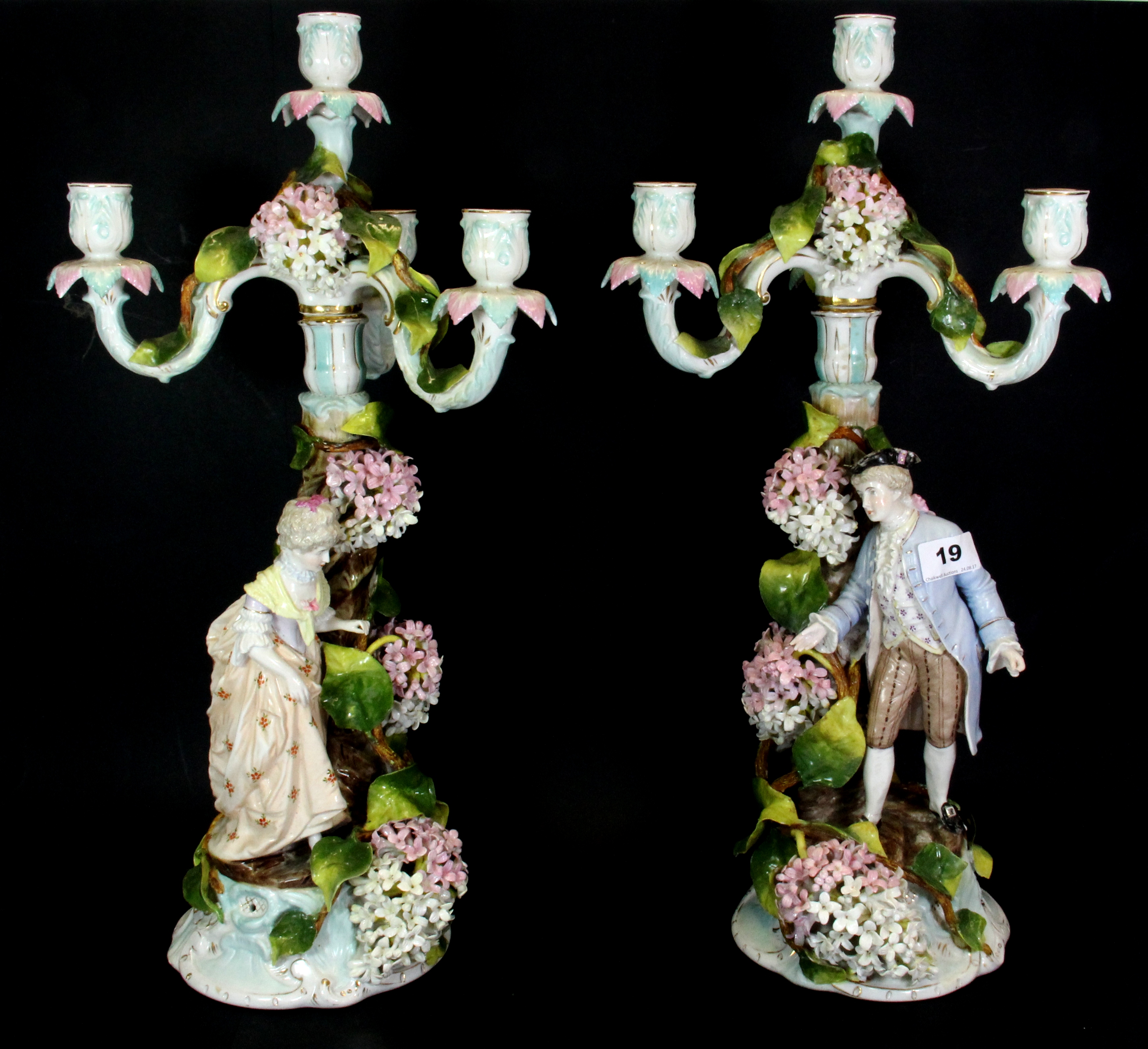 A pair of large 19th century German porcelain figural candelabra, H. 52cms.