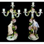 A pair of large 19th century German porcelain figural candelabra, H. 52cms.