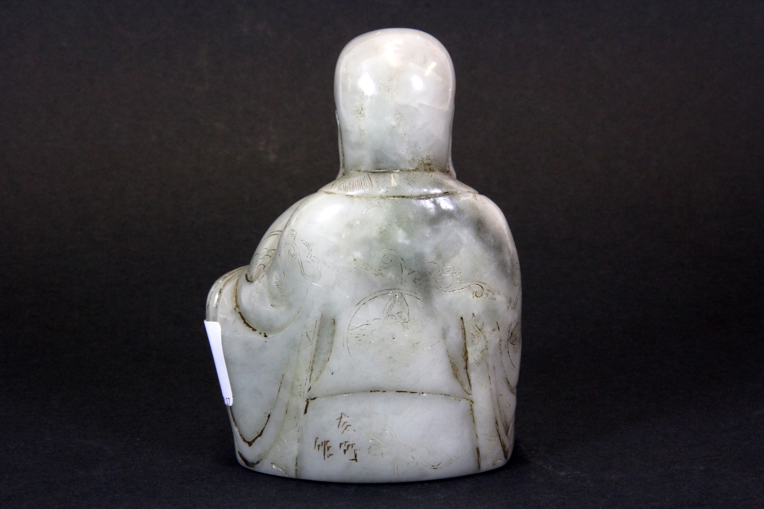 An interesting Chinese carved soapstone figural seal of a Lohan, H. 11.5cms. - Image 2 of 4