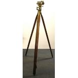 A brass surveyor's level and tripod. H.156cms.