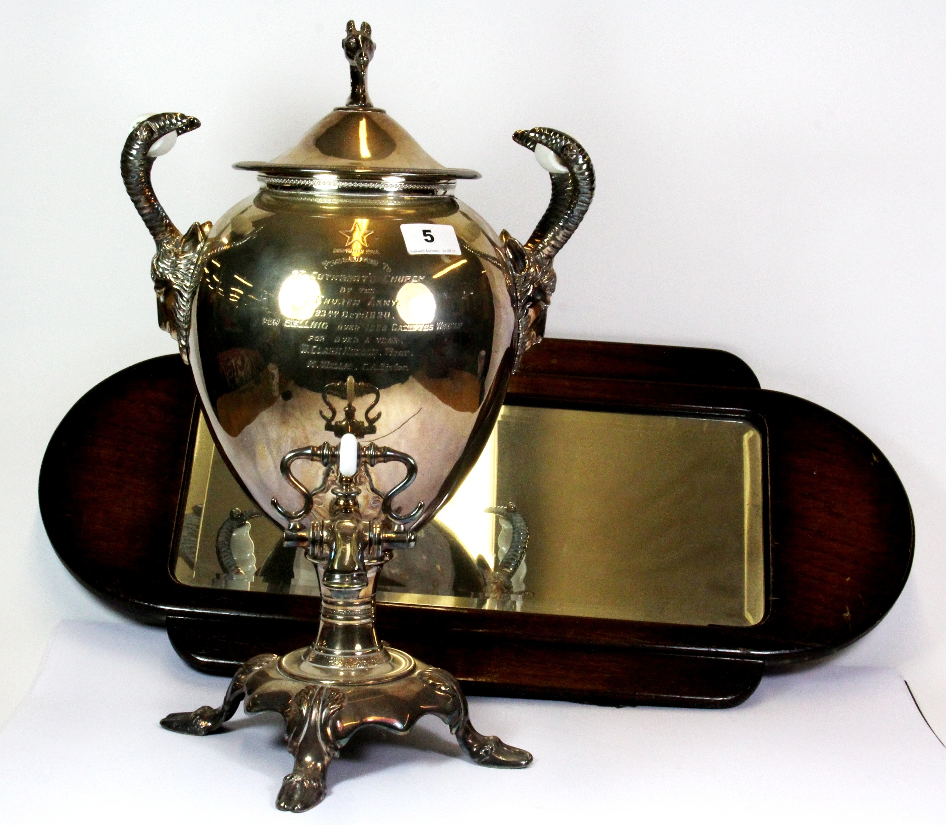 A large 1920's silver plated samovar with goats head and milk glass handles, H.47cms, together