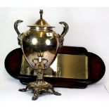 A large 1920's silver plated samovar with goats head and milk glass handles, H.47cms, together