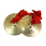 A pair of Tibetan Buddhist temple cymbals.