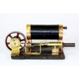 A small horizontal steam engine, 22 x 9cms.