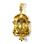 A 9ct yellow gold (stamped 375) citrine set pendant, L. 3.8cm.