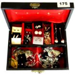 A jewellery box containing silver and other jewellery.