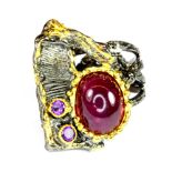 A Hana Maae 925 silver gilt ring set with a lovely cabochon cut ruby and amethyst, (P).