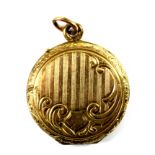 An antique yellow metal (tested minimum 9ct gold) locket portrait pendant, L. 3.2cm.