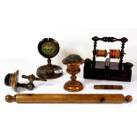 An early 19th century rosewood veneered sewing stand, together with a collection of pin cushions and