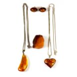 A quantity of silver and amber jewellery.