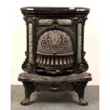 A lovely French Art Nouveau cast iron stove made by the Sougland foundry in Aisne, H. 73cm.