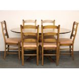 An extending contemporary dining table and six chairs.