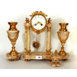 A 19th century French marble and gilt bronze three piece clock garniture, clock H. 40cm.