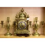 A superb 19th century Art Nouveau French brass clock set with enamelled numerals (H. 45cm), and a