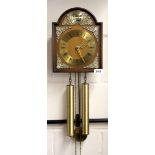 A 20th century twin weight wall clock, 28 x 22cm.