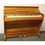 A Barratt & Robinson half sized piano, W. 116cm, H. 88cm.