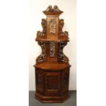 An attractive carved mahogany corner cabinet, H. 190cm, W. 72cm.