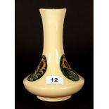 A rare Moorcroft pottery trial vase, No. 1/4 featuring peacock feathers, with box, H. 20cm.