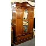 An Edwardian inlaid mahogany wardrobe, W. 120cm, H. 211cm.