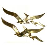 A pair of Art Deco style brass flying seagulls, W. 65cm.