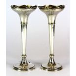 A pair of Chester hallmarked silver bud vases, H. 15cm.