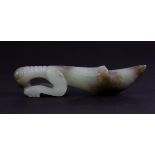 An early 20th century Chinese carved nephrite jade figure of a praying mantis, L. 9.5cm.