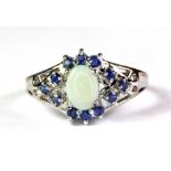 A 9ct white gold opal and sapphire cluster ring, (P).