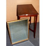 An Edwardian inlaid mahogany side table and a gilt mirror.