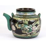 An early 20th century Chinese enamelled terracotta teapot, H. 14cm.